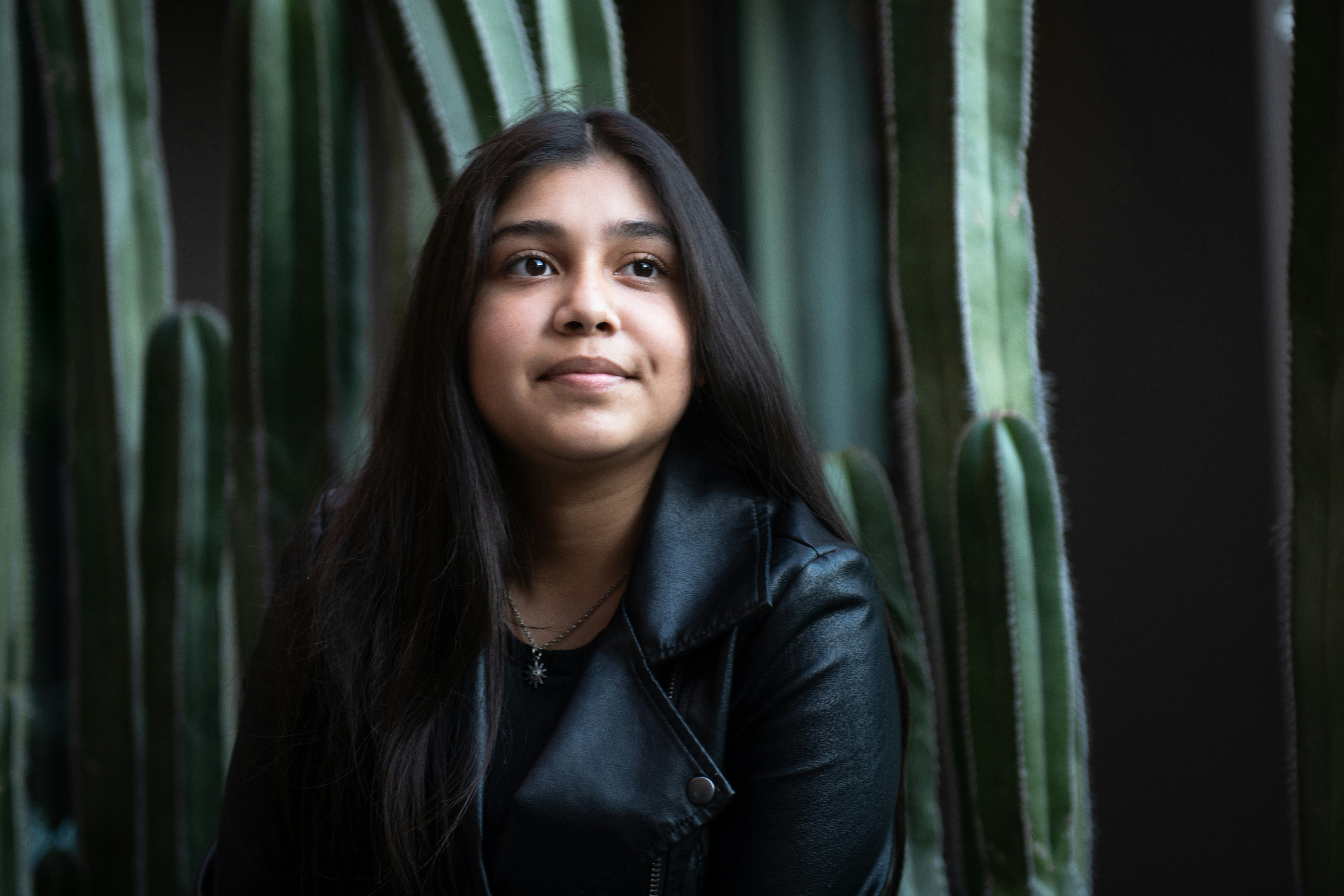 woman in black leather jacket